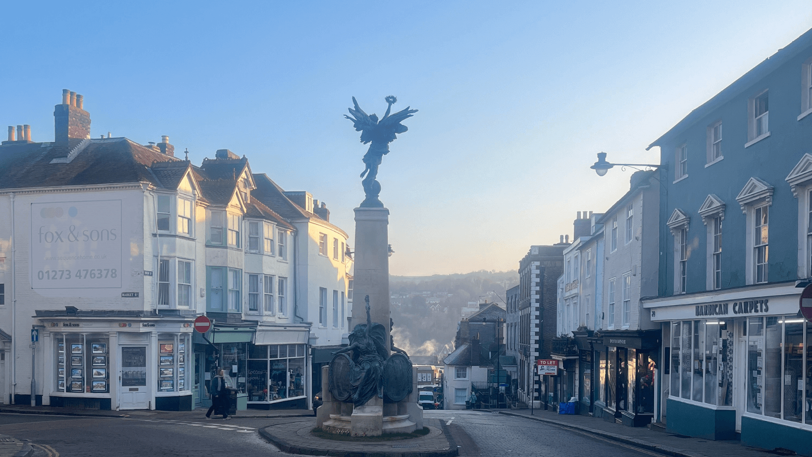 A view of School Hill in Lewes, East Sussex, with the War Memorial visible on a winter's day
