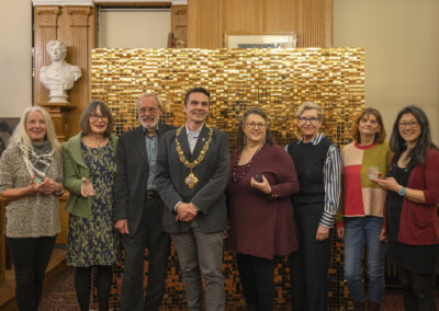 The Mayor of Lewes Councillor Matthew Bird with the winners of the 2024 Lewes Civic Awards in the Council Chamber at Lewes Town Hall