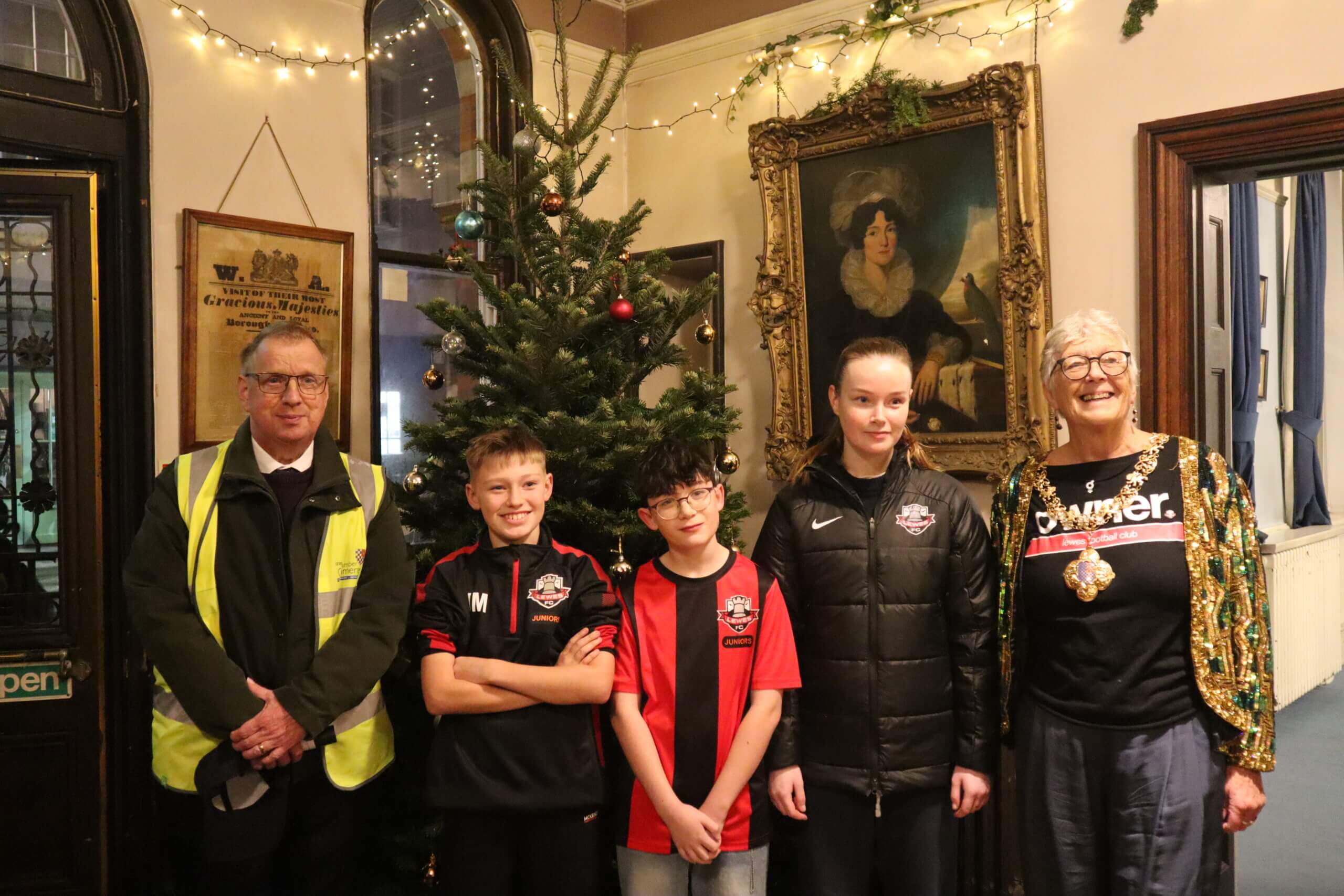 The Mayor of Lewes with Lewes FC players and the President of the Chamber of Commerce